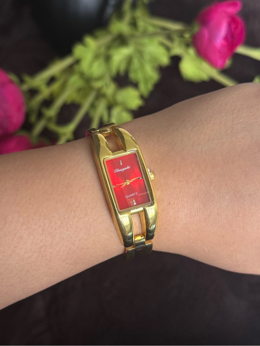 Gold Tone Bracelet Watch with Red Dial
